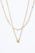 Collier multi-rangs avec perles et étoile