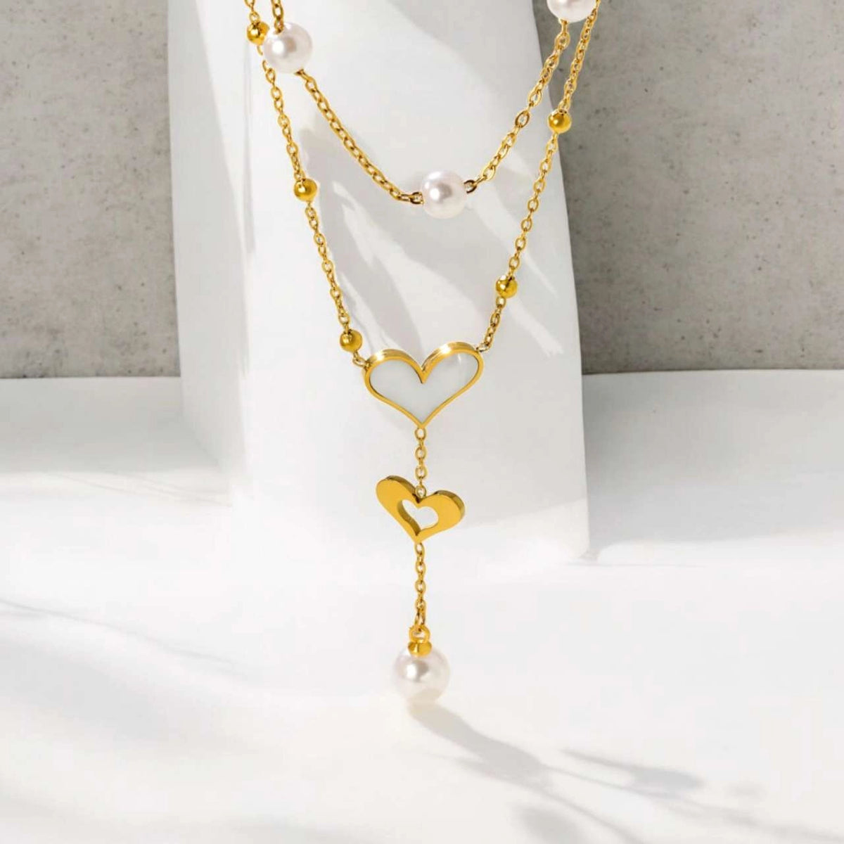 Collar de Doble Cadena con Corazón y Perla